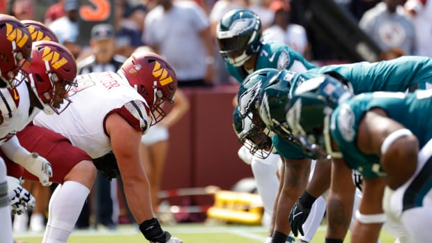 The Washington Commanders offense lines up against the Philadelphia Eagles defense during the first quarter at FedExField. Mandatory Credit: Geoff Burke-USA TODAY Sports